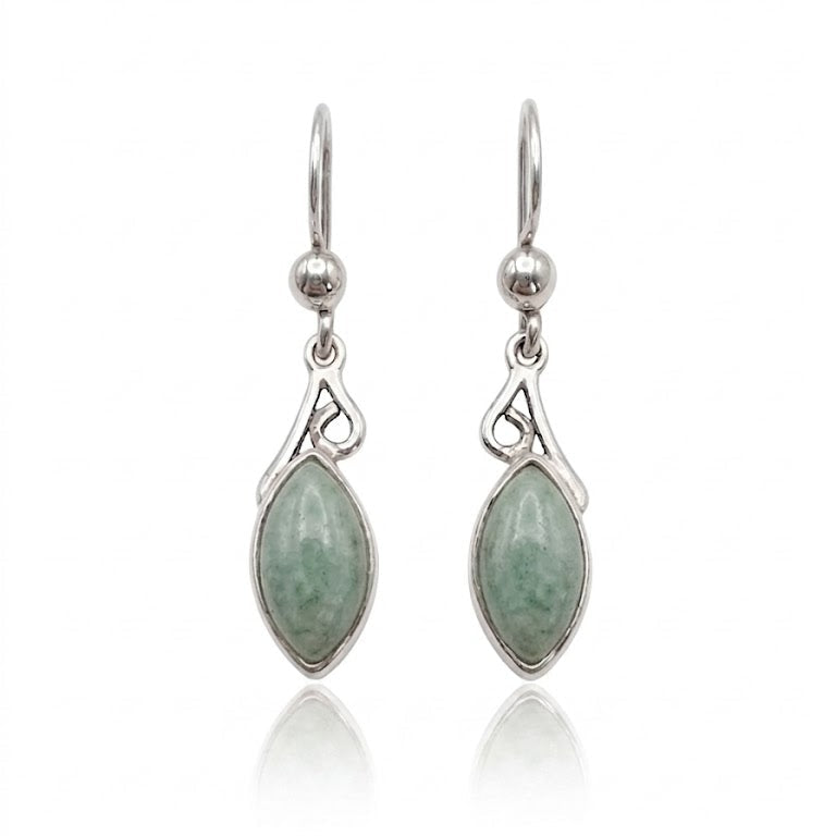 Silver earrings with green jade on a white background