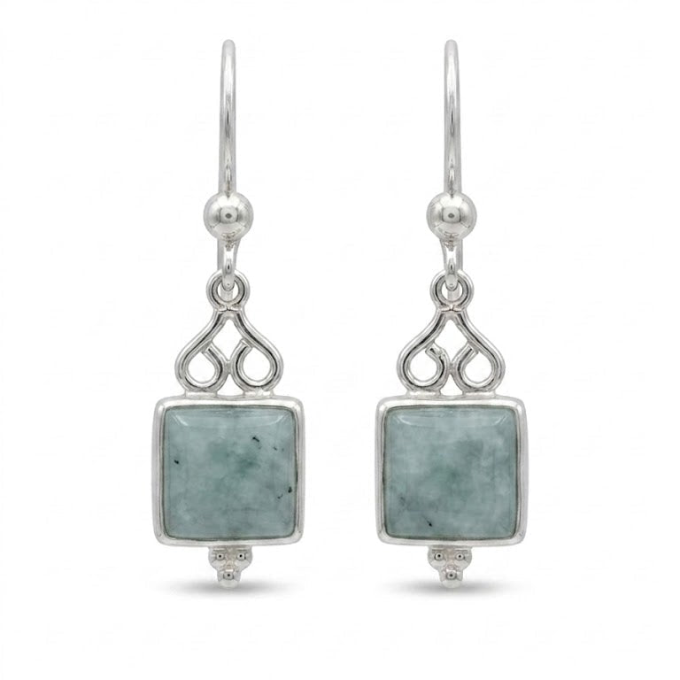 Silver earrings with square green jade gemstones on a white background