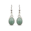 Pair of silver earrings with green jade stones on a white background