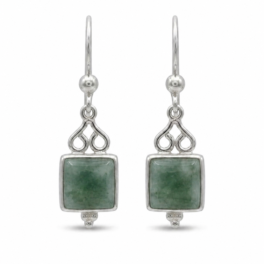 Silver earrings with square jade stones on a white background