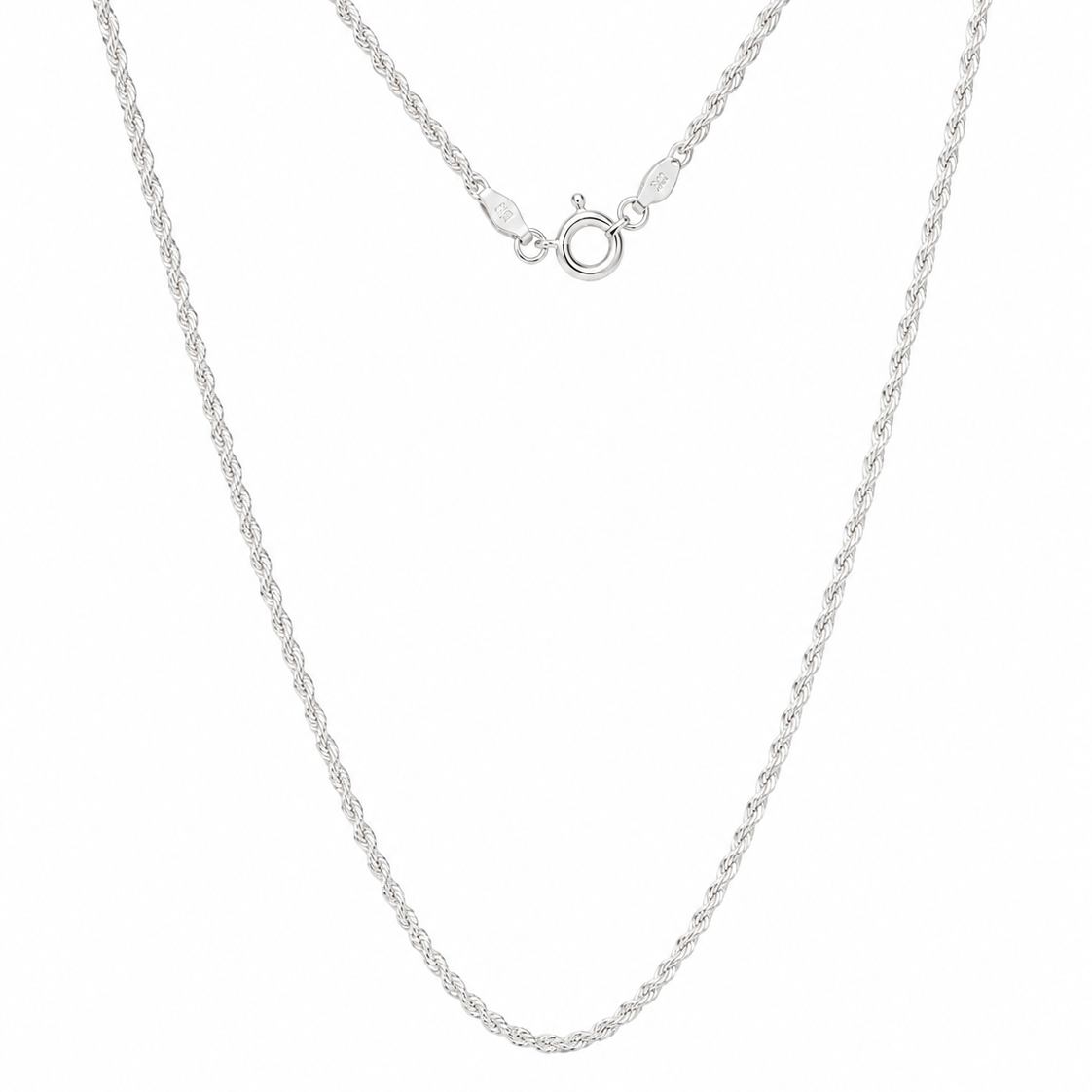silver rope necklace against white studio background 